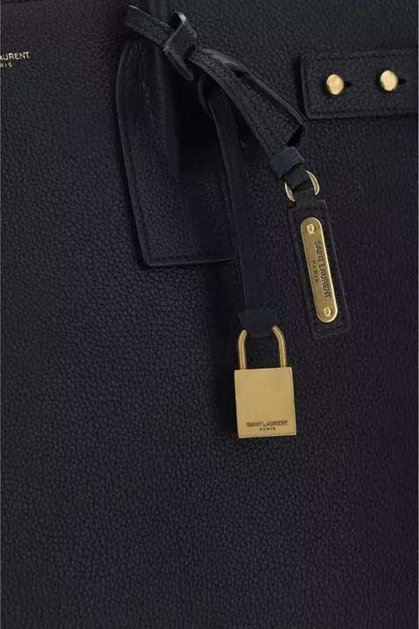 Black textured leather Saint Laurent Sac De Jour bag with gold hardware details