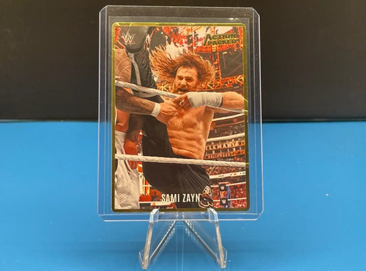 SAMI ZAYN 2023 Panini Chronicles WWE ACTION PACKED Card #AP-7 featuring Sami Zayn