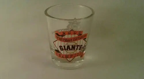 Clear glass San Francisco Giants shot glass with baseball-themed logo for Giants shot collection