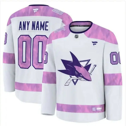 White and pink San Jose Sharks hockey jersey with shark logo for Hockey Fights Cancer
