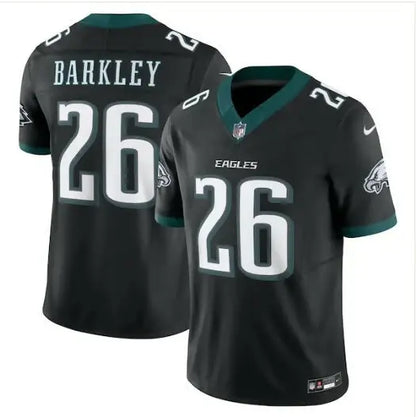 Two black Philadelphia Eagles Nike Vapor Fuse jerseys with green trim and white numbers