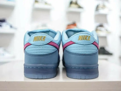 Light blue Nike Sneakers with pink accents and gold NIKE embroidery, fast shipping available