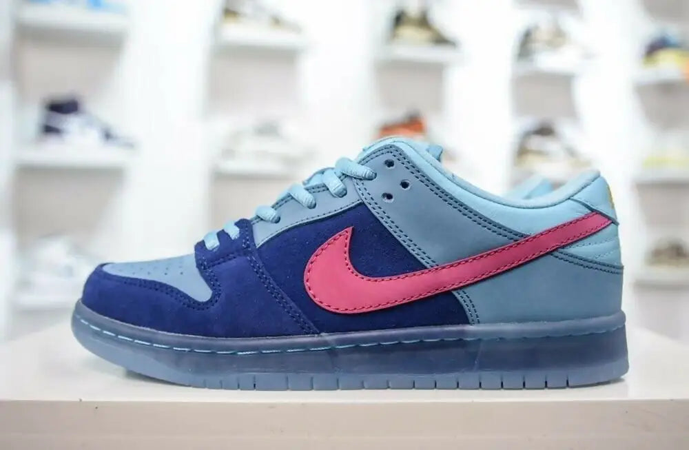 Sb Dunk Low Run The Jewels sneaker with two-toned blue, pink swoosh, translucent sole, fast shipping