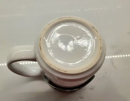 White ceramic coffee mug bottom featuring Seattle Seahawks NFL logo ceramic coffee cup