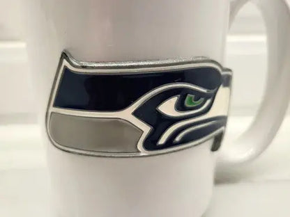 Seattle Seahawks ceramic coffee mug with raised NFL football logo design