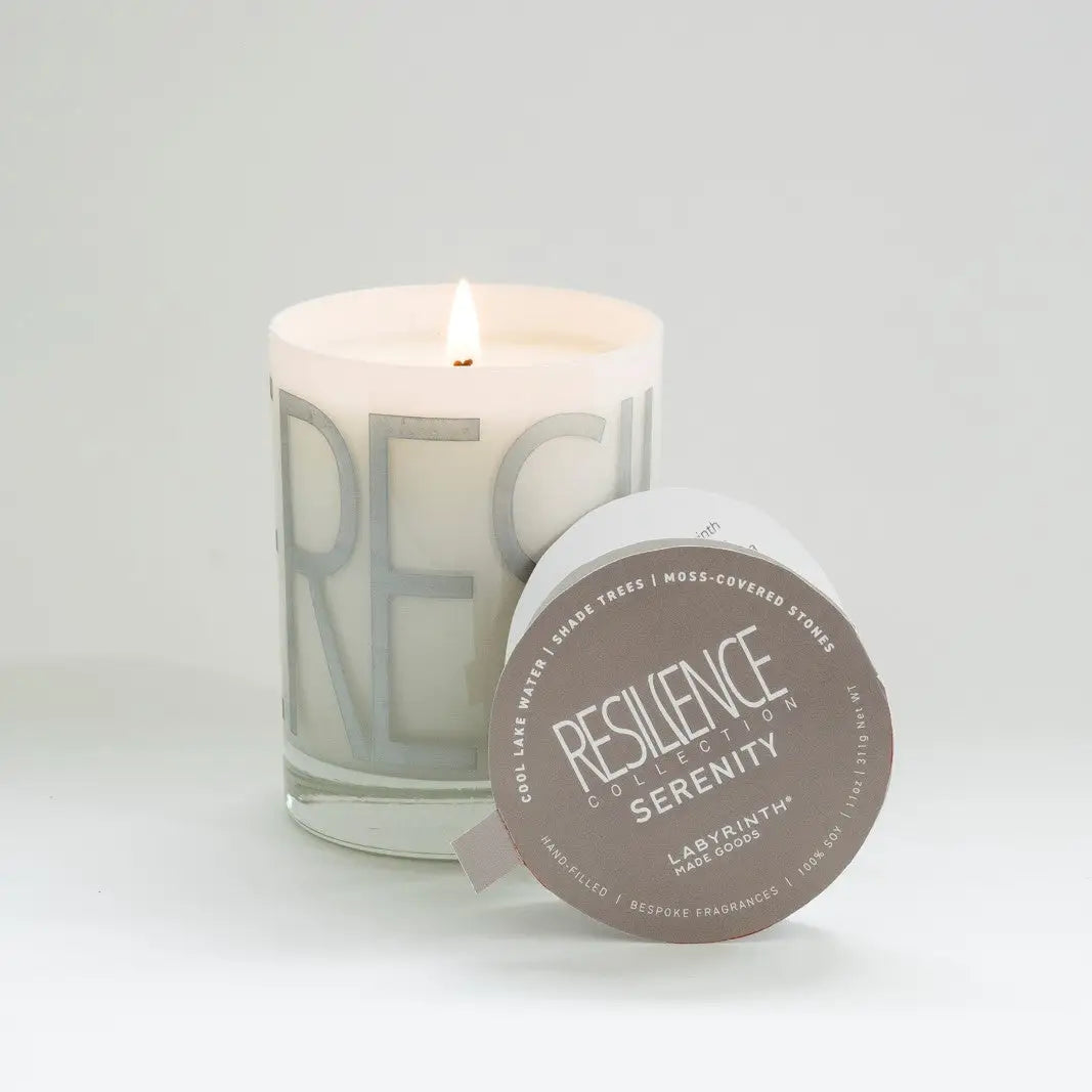 Serenity candle is filled in a beautiful custom glass vessel with the word - 60-hour burn - candle