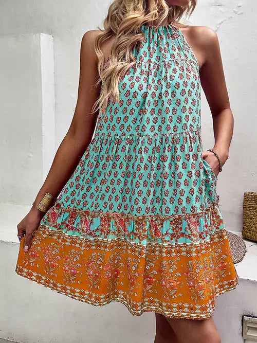 Woman modeling turquoise hollow pleated summer party dress mujer with orange floral hem