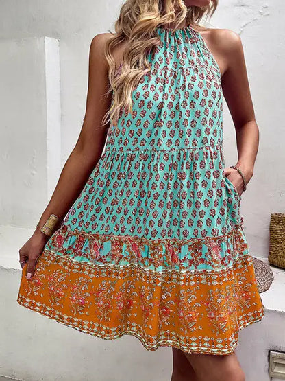 Woman modeling turquoise hollow pleated summer party dress mujer with orange floral hem