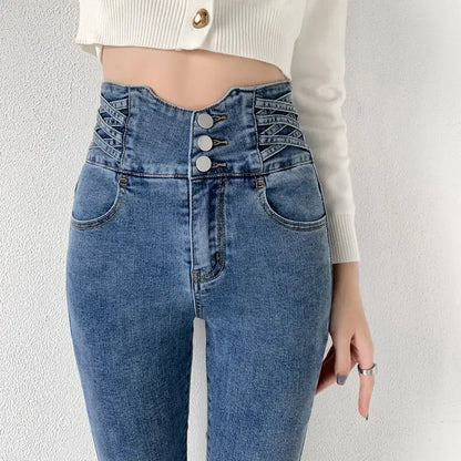 Skinny pencil jeans with vintage high waist, crisscross detailing, and three buttons