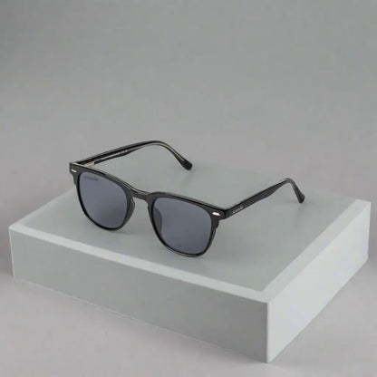 Black framed Smooder sunglasses with dark gray lenses for stylish sun protection