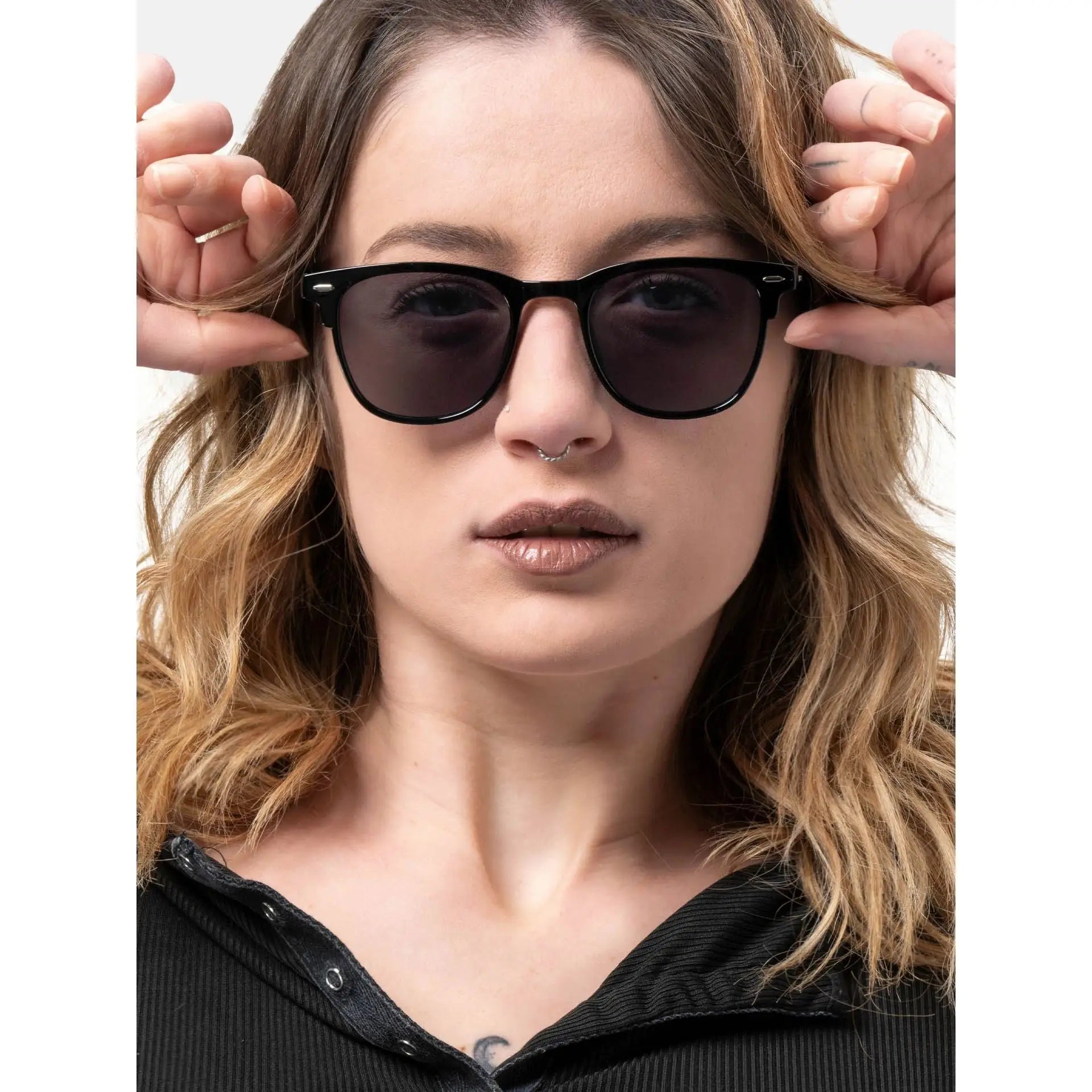 Woman wearing black Smooder Sonora_X019 Ultra Black Sunglasses for stylish eye protection