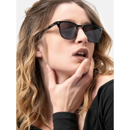 Woman modeling Smooder Sonora_X019 Ultra Black Sunglasses with dark lenses