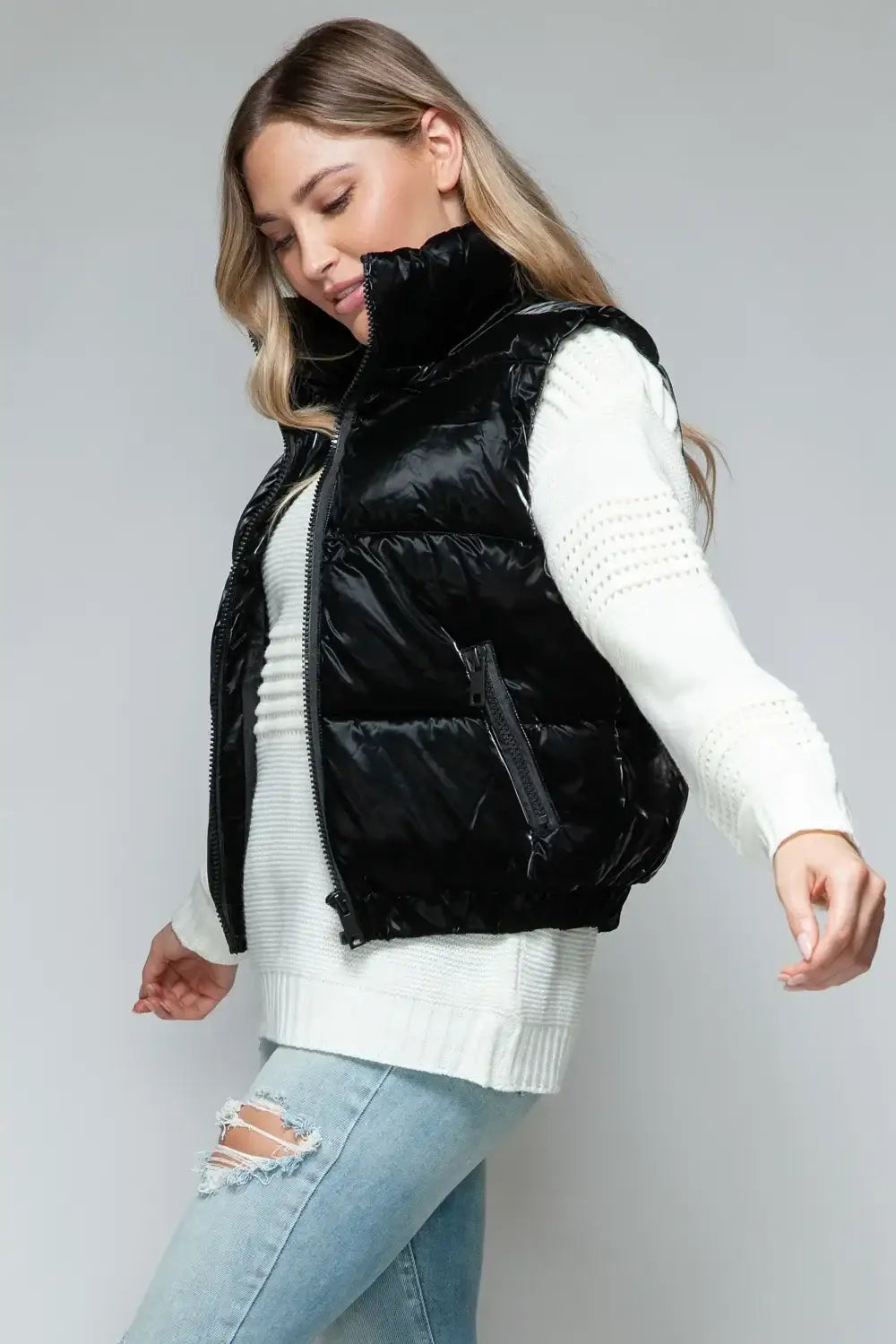 Black puffer vest with fur lining and quilted design from Snobbish Fine Fur Lining collection