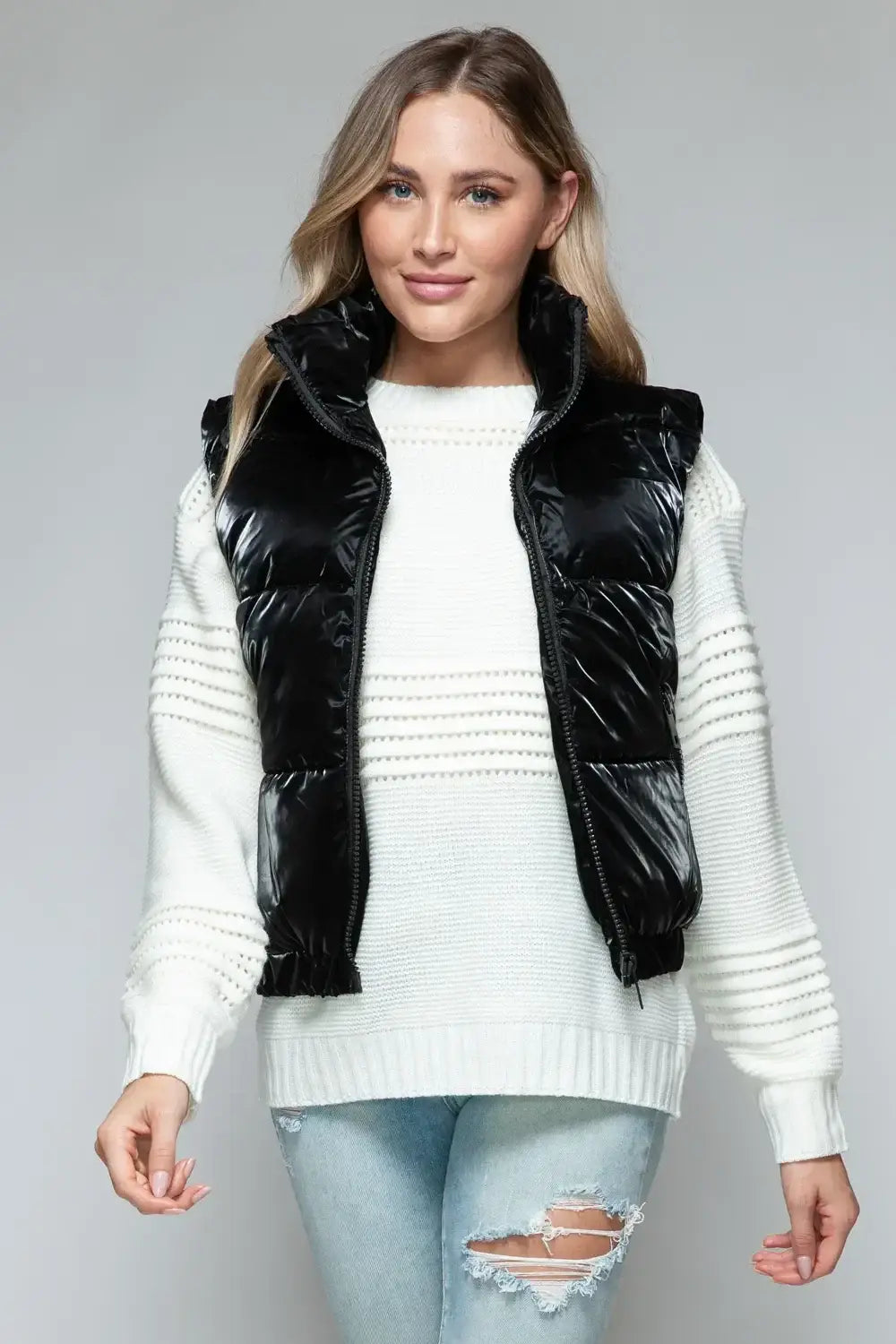 Black quilted puffer vest with fur lining and zipper closure from Snobbish Fine Fur Lining collection