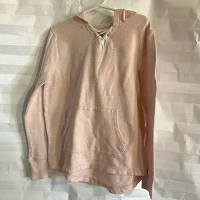 Light pink hooded sweatshirt with lace-up front and long sleeves for Girls Size 7/8