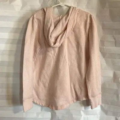 Light pink hooded sweatshirt with long sleeves on a hanger from SO The Perfect Hoodie Girls Size 7/8