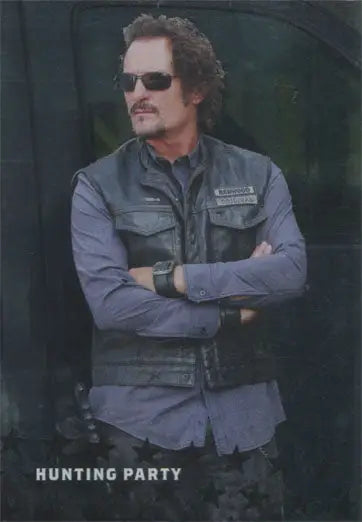 Man with curly hair in sunglasses and vest on Sons of Anarchy trading card