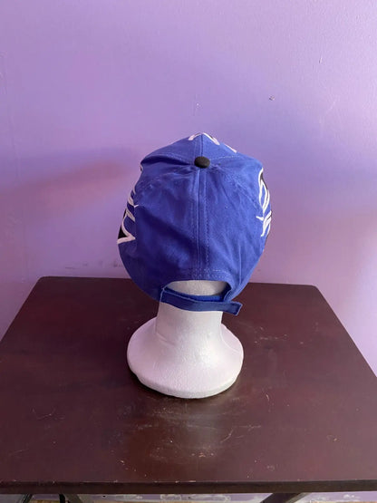 Southpoint Blue/Black Flame Racing Hat Signed by Brendan Gaughan NASCAR on display