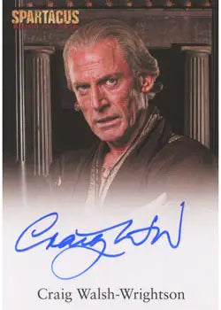 Autographed trading card of Craig Walsh Wrightson with gray hair on dark background