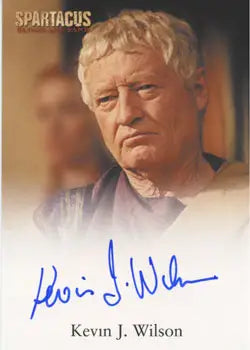 Headshot of older man in light tunic for Spartacus Vengeance autograph card by Kevin J. Wilson