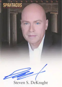Headshot of bald man in white shirt, featured on Spartacus Vengeance Autograph Card
