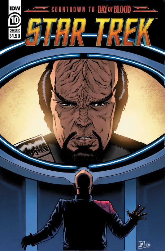 Star Trek comic book cover featuring Klingon warrior reflection in viewscreen
