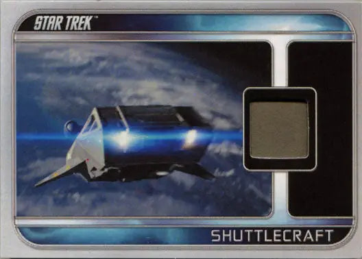 Sleek Star Trek shuttlecraft flying through clouds, featured in trading cards collection