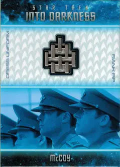 Metallic uniform badge card featuring an intricate geometric design inspired by Star Trek