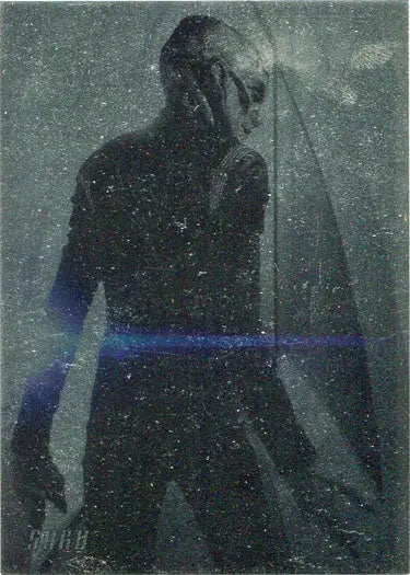 Silhouette in snowy mist with blue light in Star Trek Discovery Preview trading card