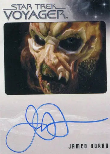 Alien creature with wrinkled yellowish face and sharp teeth on James Horan trading card