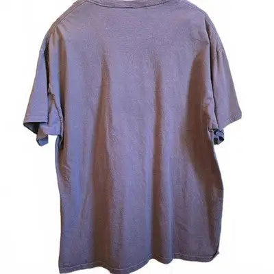 Plain purple short-sleeved T-shirt featuring a Baby Yoda graphic for Star Wars fans