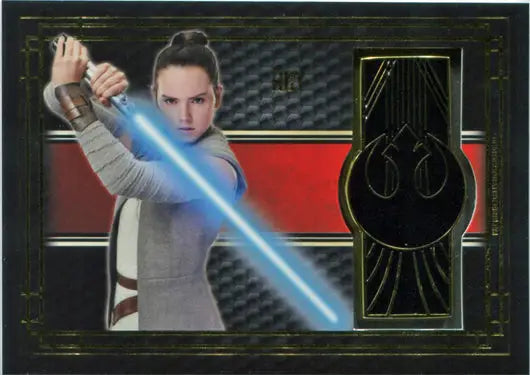 Young woman in white robes with a blue lightsaber on Star Wars commemorative emblem card