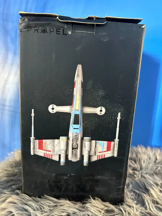 Star Wars X-Wing drone in packaging from Star Wars R2-D2 & Drone Remote Control Toy Set