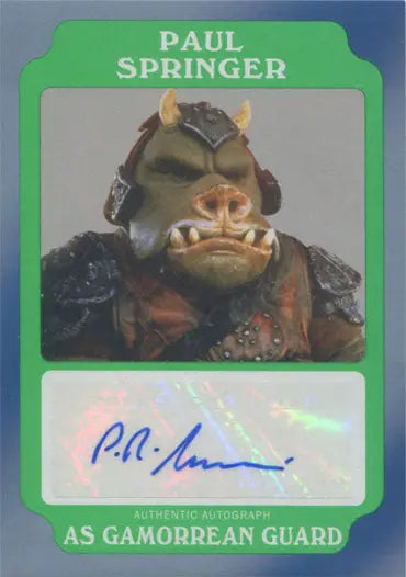 Green autograph card featuring a grotesque alien by Paul Springer in Star Wars trading cards