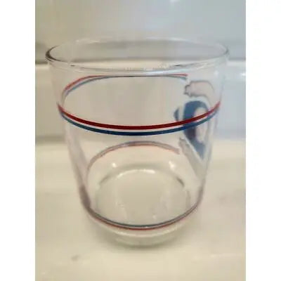 Clear glass with red and blue stripes from Vintage Houston Oilers NFL 12 oz Shell Oil
