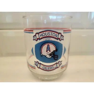 Vintage Houston Oilers glass showcasing NFL team memorabilia and Shell Oil branding