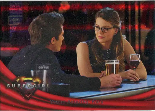 Two people enjoying drinks and conversation featured on a Rainbow Foil Board card