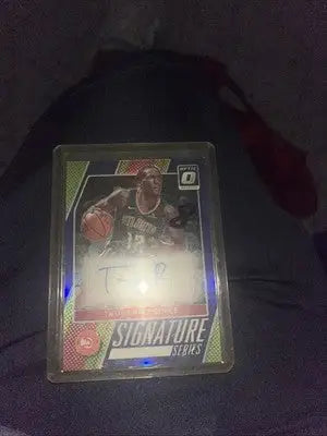 Trae Young autographed basketball card from Donruss Optic Signature Series Purple