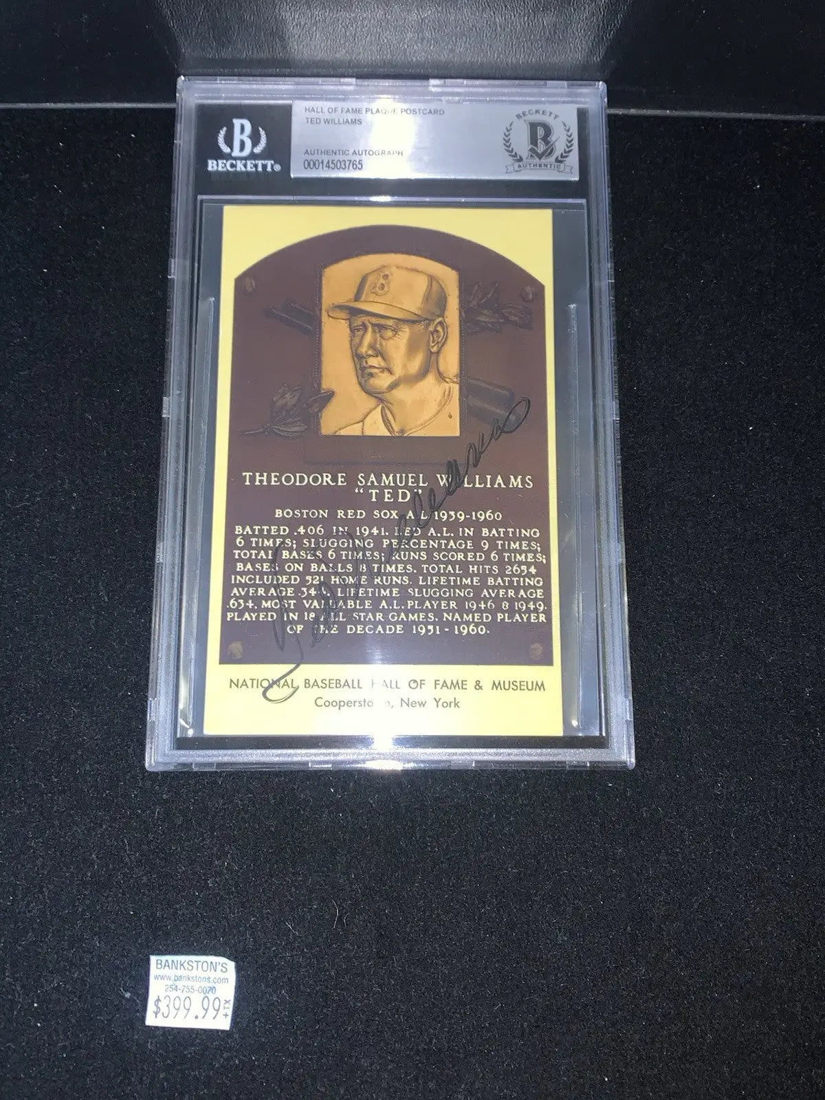 Graded Ted Williams baseball card from the Red Sox, featured in a signed plaque postcard