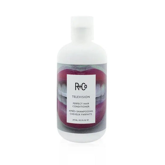 White bottle of R+Co Television Perfect Hair Conditioner with pink and grey label