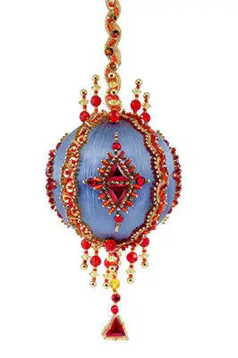 Ornate blue and red beaded Christmas ornament from The Cracker Box Ornament Kits