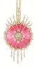 Vibrant pink circular pendant with diamond accents on gold chain from Cracker Box Christmas Ornament Kit