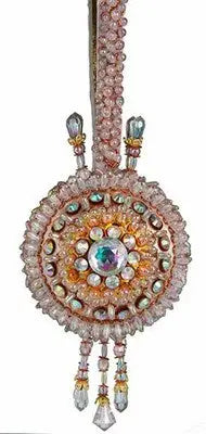 Ornate pink and clear beaded medallion pendant with iridescent gemstone for Christmas ornament