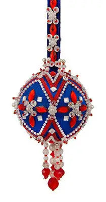 Blue, red, and white beaded Christmas ornament with dangling beads from Cracker Box Crystal Ball kit