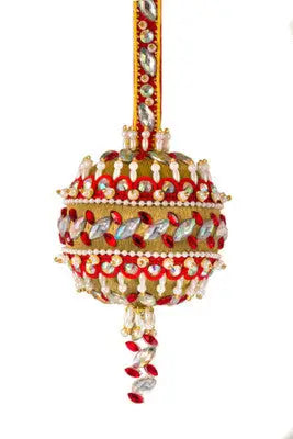 Ornate gold and red Christmas ornament with gemstones and pearls from Cracker Box White Christmas kit