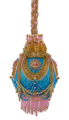 Ornate beaded tassel in blue pink gold for Christmas ornament white Christmas cracker box