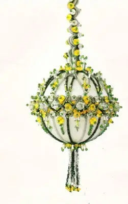 Beaded Christmas ornament from Cracker Box Golden Oldie Bijou kit with yellow, green, and clear beads
