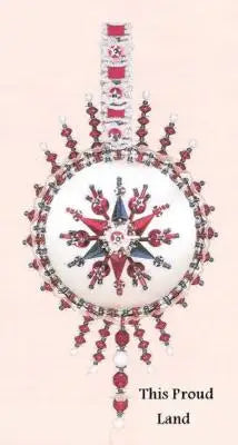 Ornate handcrafted red, white, and blue Christmas ornament from Cracker Box Golden Oldie kit