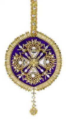 Ornate purple and gold embroidered Christmas ornament with jeweled cross design from Cracker Box Christmas ornament kit