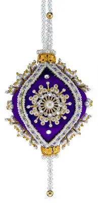 Ornate purple and gold Christmas ornament from Cracker Box Christmas Ornament Kit